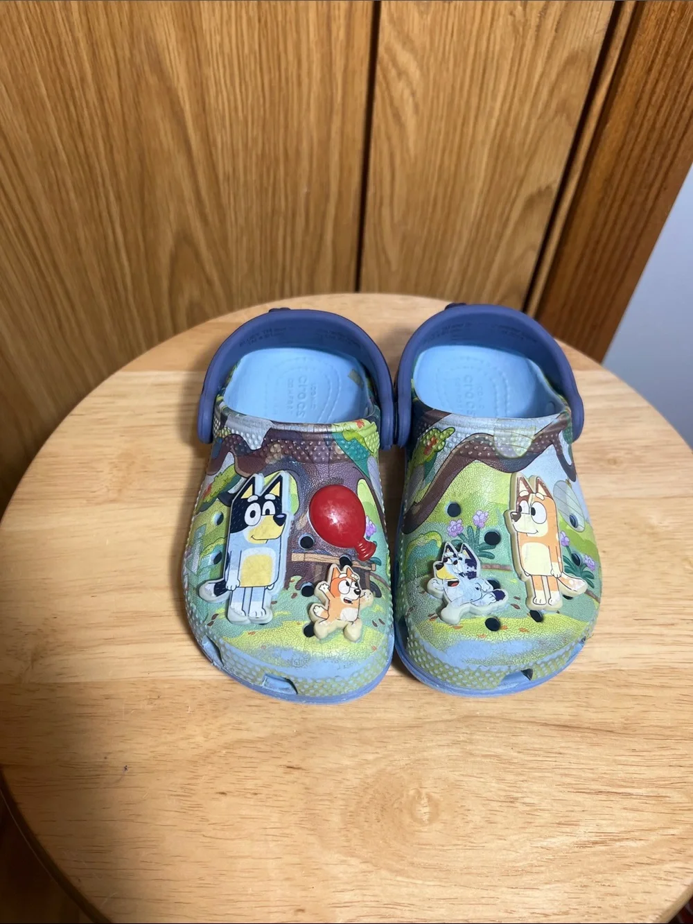 CROCS Blue Kids Cartoon Slip-On Clogs with Red Balloon Accent